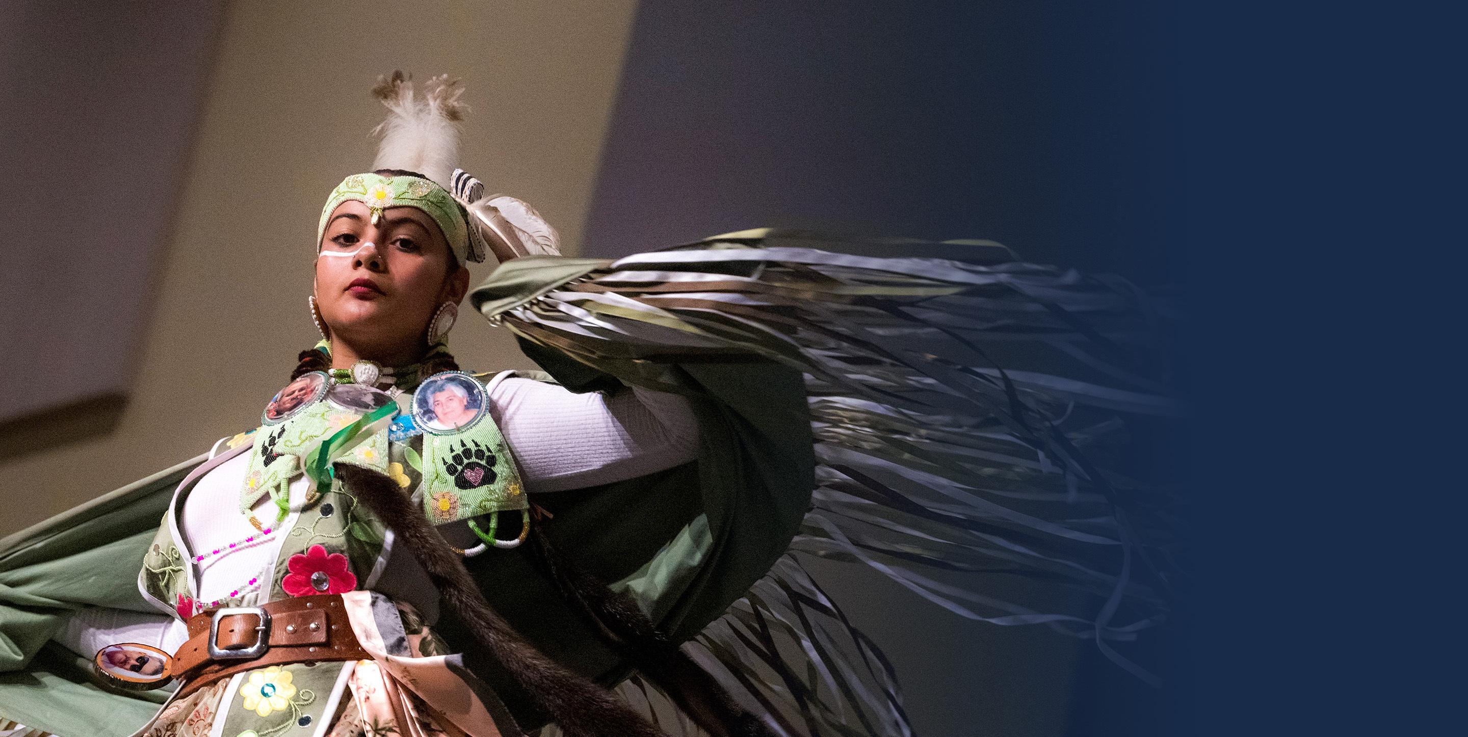 Dancer wearing traditional Native American dress